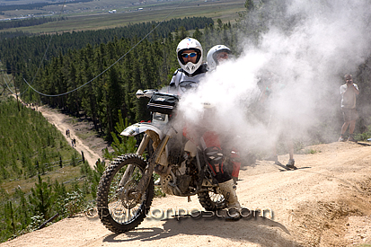 Film crew Scott Ogle & Dave Taylor on overheated motorcycle