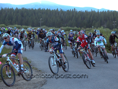 Race heading from pavement to single track