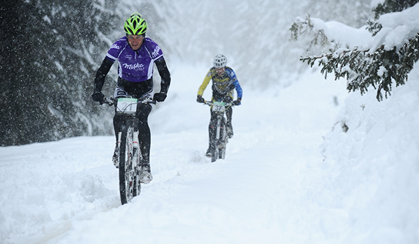 Alpentour riders in heavy snow